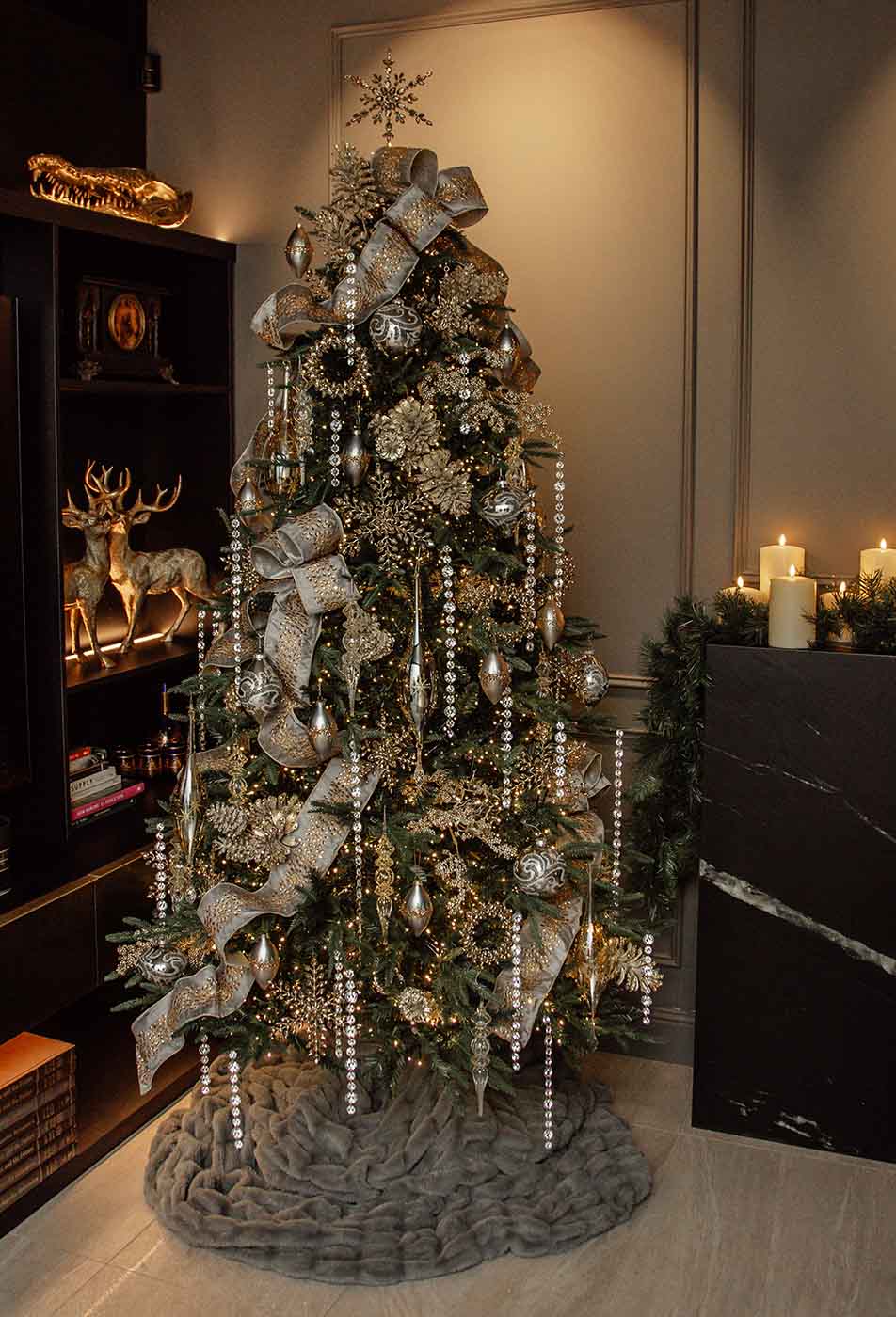 Elegant gold-trimmed Christmas tree with metallic ornaments and ribbons, premium christmas tree design and christmas decorations pack.