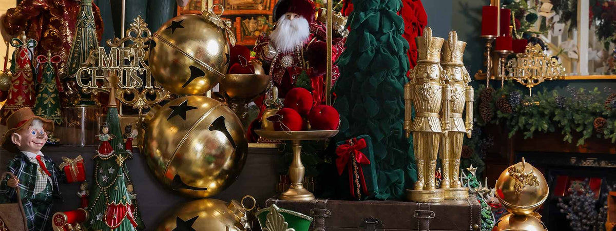 Gold jingle bells, a Santa figure, velvet cone tree and gold nutcrackers on display inside the Dancer & Dasher Christmas store in Sydney