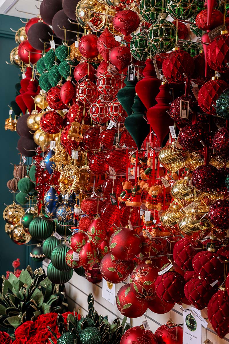 Rows of red, gold and green baubles and velvet ornaments, Sydney Christmas decorations at Dancer & Dasher